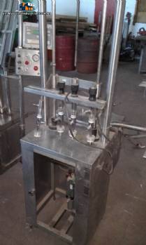 Linear filling machine with 6 stainless steel spouts Linear filling machine with 6 stainless steel spouts